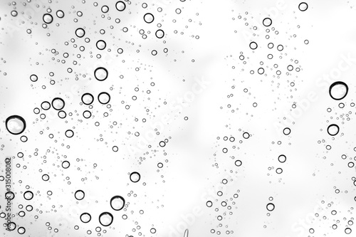 Rain drops on window glasses surface Natural Pattern of raindrops. Natural pattern of raindrops on white background for your design.