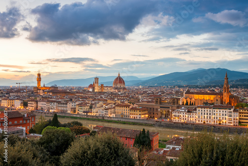 Amazing panoramic sunset view of Florence city, Italy with the river Arno, Palazzo Vecchio, Cathedral of Santa Maria del Fiore and Basilica of Santa Croce. © Jess_Ivanova