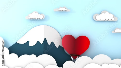 Love and Valentine's Day. A heart-shaped balloon flies among the clouds.