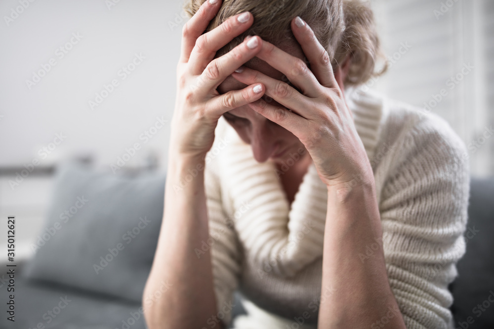 Pregnant tired exhausted woman with stomach and head issues at home on a couch, being sick. Pregnant tired exhausted woman with stomach and head issues at home on a couch, being sick.