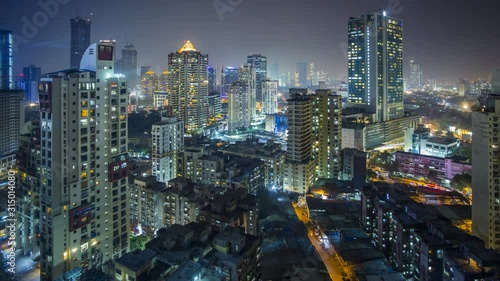 India, Mumbai, Maharashtra, city skyline time lapse of modern office and residential buildings 