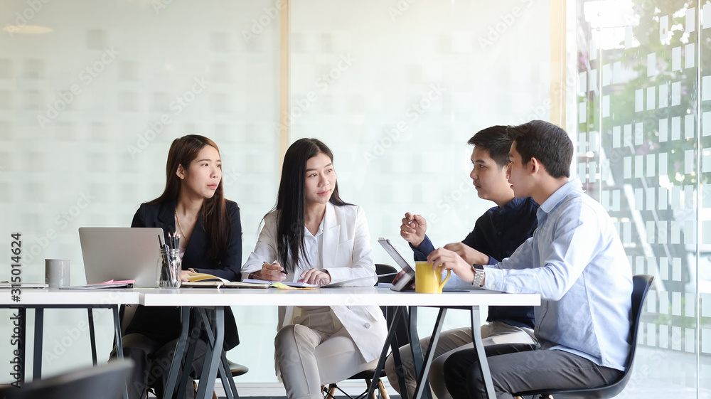 Business working in office with documents and laptop people Consulting and business planning. Business working in office with documents and laptop people Consulting and business planning.