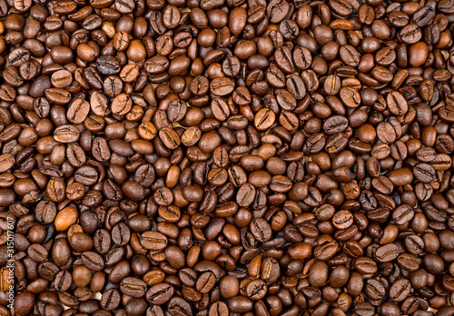 Roasted coffee beans texture used as a background