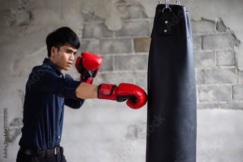 Powerful young man punching you in the face stock photo © chaunpis