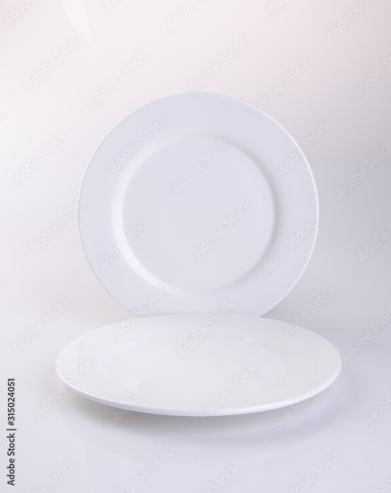 plate or empty plate on a background new. plate or empty plate on a background new.