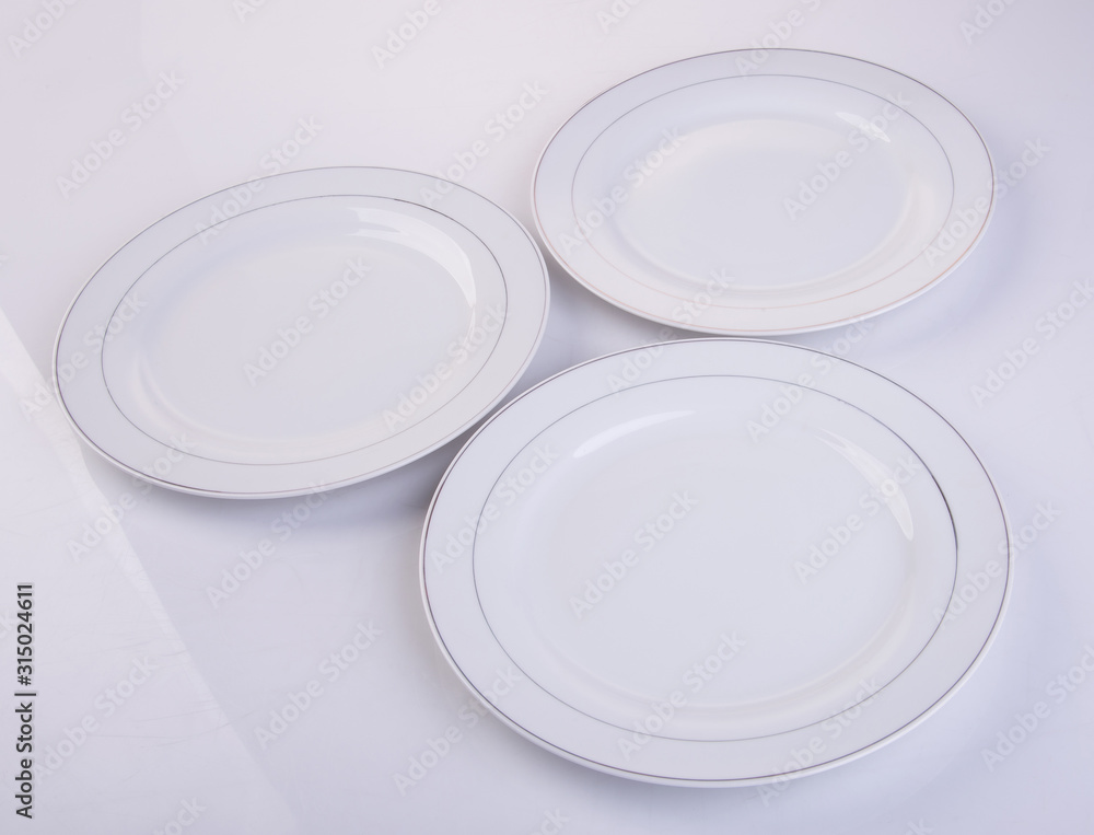 plate or empty plate on a background new. plate or empty plate on a background new.