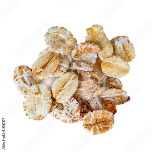 Canvastavla Oat flakes isolated on white background. Top view.