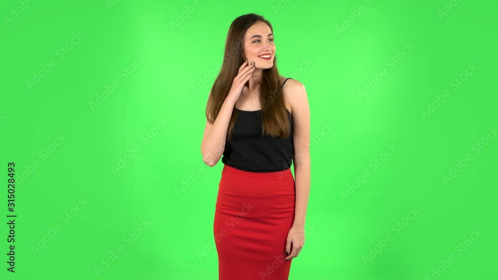 Girl is shocked and surprised at what is happening around, looking with delight and admiration. Green screen Girl is shocked and surprised at what is happening around, looking with delight and admiration. Green screen