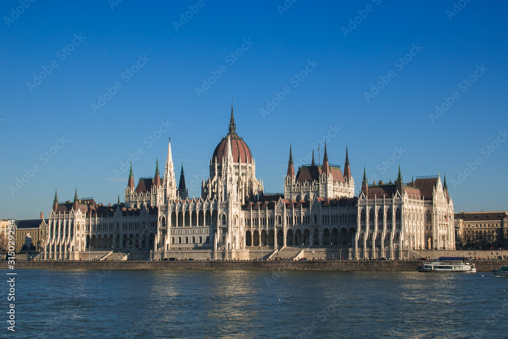 Fototapeta premium Winter view of Parliament building on the banks of the Danube, Budapest, Hungary