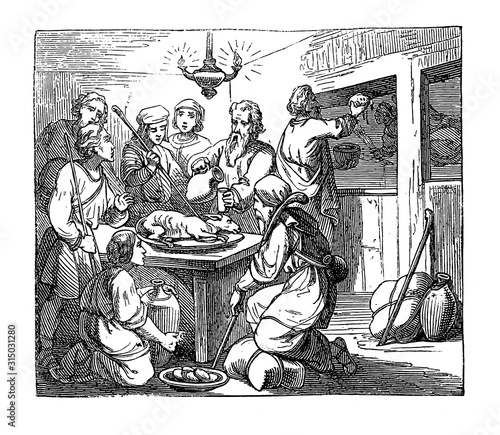 Vintage drawing or engraving of biblical story of the Passover, Eastern lamb eaten before Israelite left the slavery in Egypt.Bible, Old Testament,Exodus 12. Biblische Geschichte , Germany 1859.
