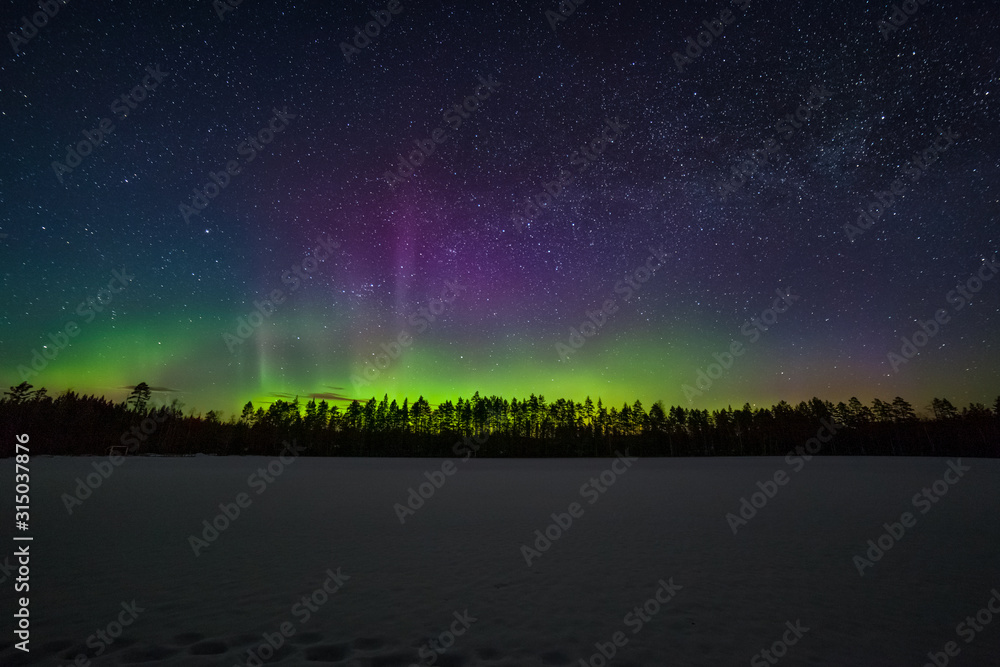 one million stars during the Northern Lights. Sweden. long exposure. Milky way