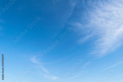 Blue sky with cirrus cloud. It's clearing day and good weather in the morning. It's best time for travelling on holiday.