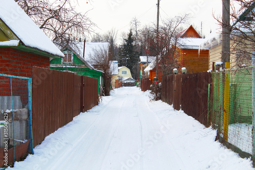 Horticultural Partnership in Russia. Street and houses in winter. Scenery. photo