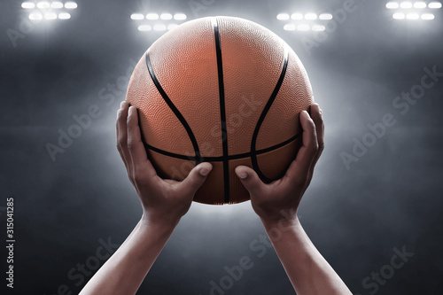 Basketball player throwing a ball © fotokitas