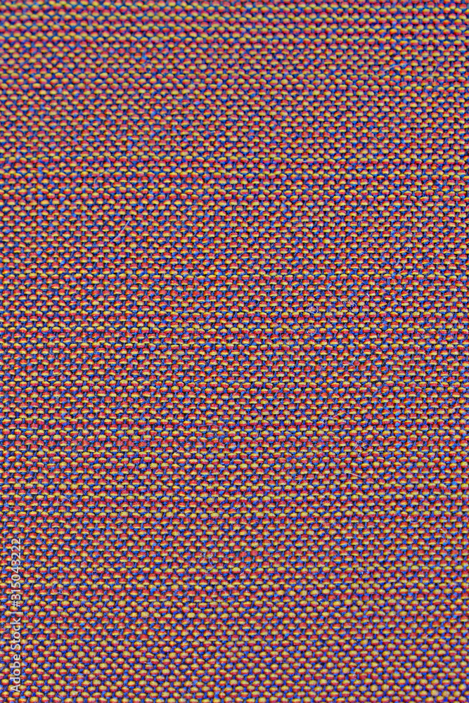 Texture of rough red and yellow fabric with a seam in a line. Cloth background with smooth lines. Texture of rough red and yellow fabric with a seam in a line. Cloth background with smooth lines.