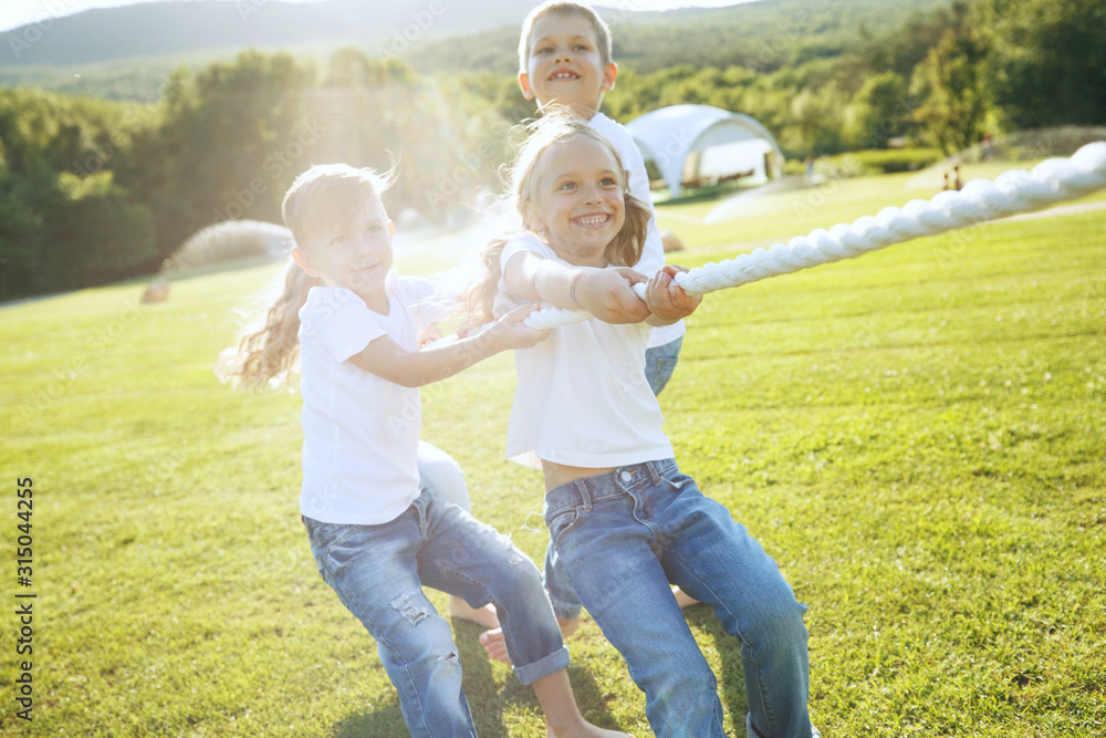 Fototapeta premium Children play in nature.