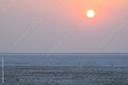Sunset at the White dessert Dhordo  Kutch  Gujarat  India  use for background  sunset evening 