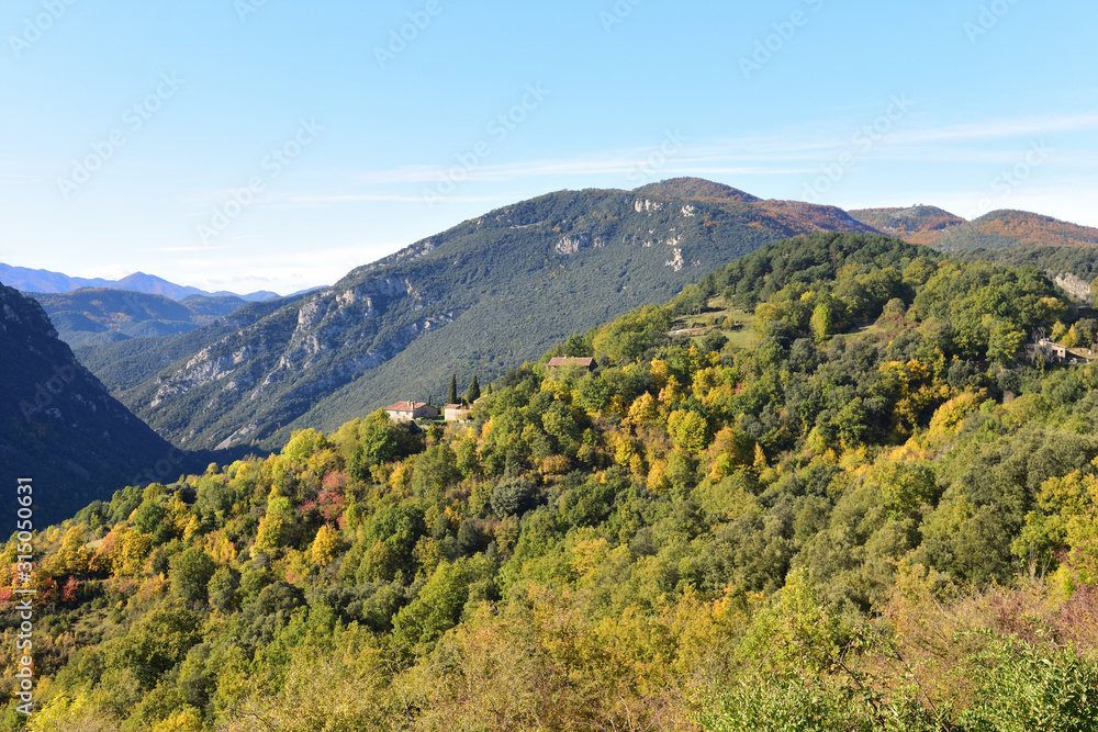 autumn landscape of Garrotxa near Beget, Girona province, Catalonia, Spain.(Photo takes on the road from Oix to Beget)o takes on the road from Oix to Beget)
