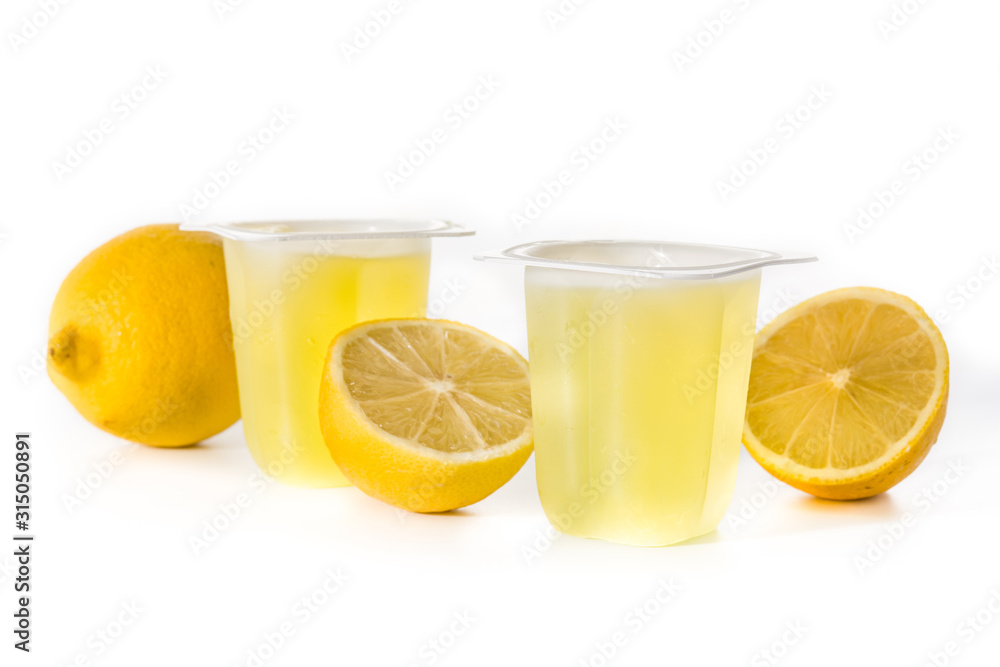 Lemon jellies on a plastic cup isolated on white background Lemon jellies on a plastic cup isolated on white background
