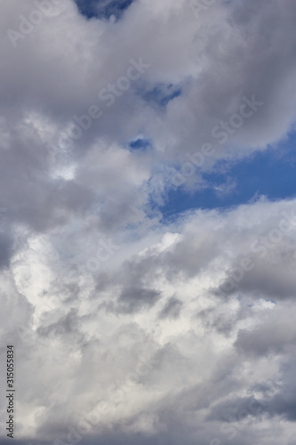 Clouds background on the blue sky. Cloudscape. Texture