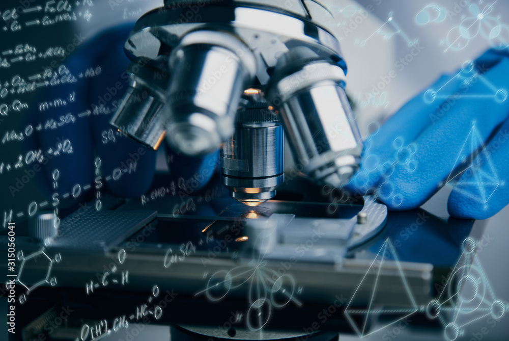 Close-up shot of microscope with metal lens. Close-up shot of microscope with metal lens.