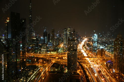 Dubai city views during heavy rains at night from the hotel window in January 2020