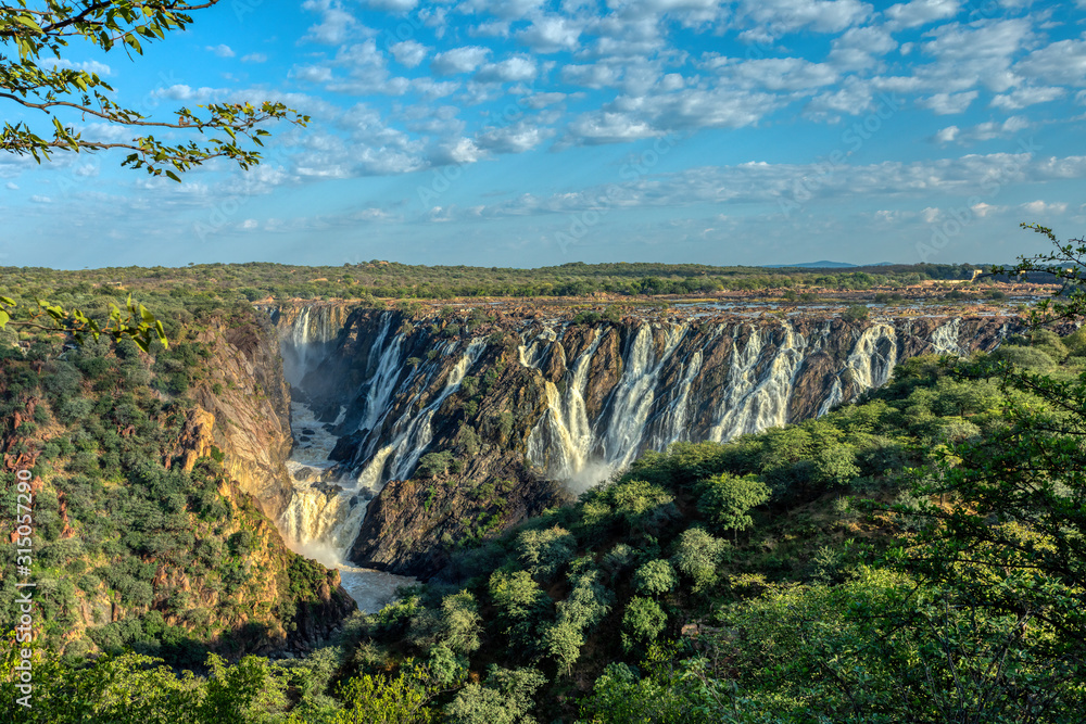 landscape of Ruacana Falls on the Kunene River in Northern Namibia and Southern Angola border, Africa wilderness landscape
