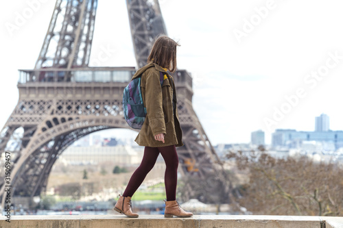 girl on the background of the Eiffel Tower © Sergii Mostovyi