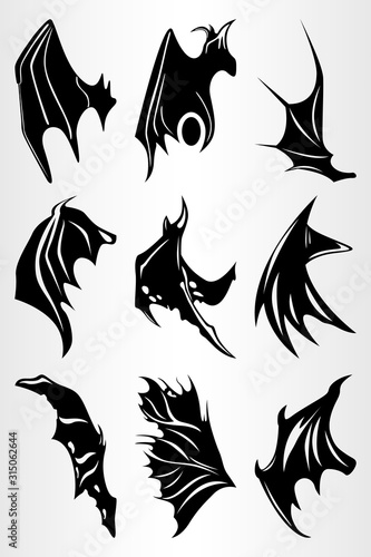 Set of different wings, demons and bats . The silhouette of the wings. Drawing for tattoo.