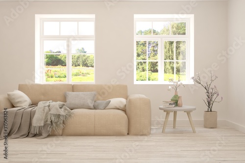 Stylish room in white color with sofa and summer landscape in window. Scandinavian interior design. 3D illustration