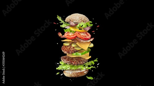 Flying homemade burger with moving ingredients.