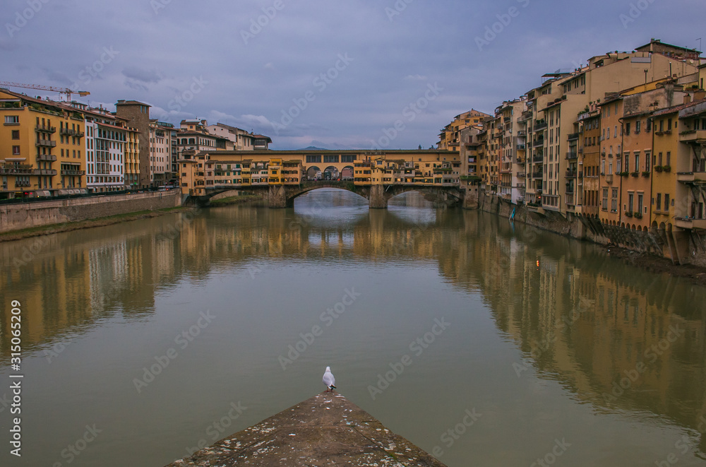 View of Ponte Vecchio Bridge - “Old Bridge”- is the most famous bridge in Florence and undoubtedly one of the city’s most illustrious landmarks
