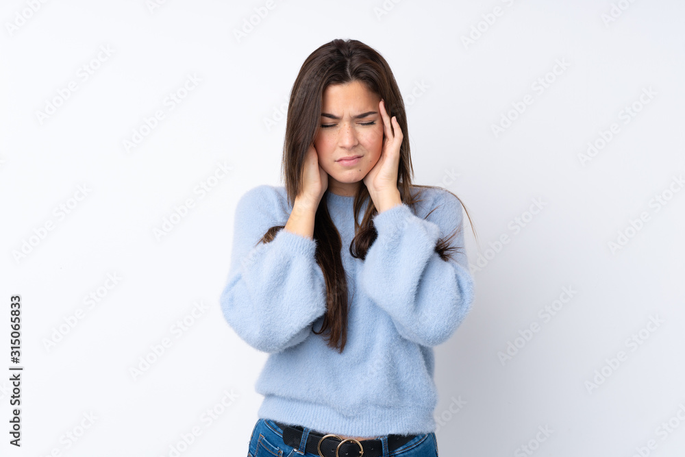 Teenager girl over isolated white background with headache Teenager girl over isolated white background with headache