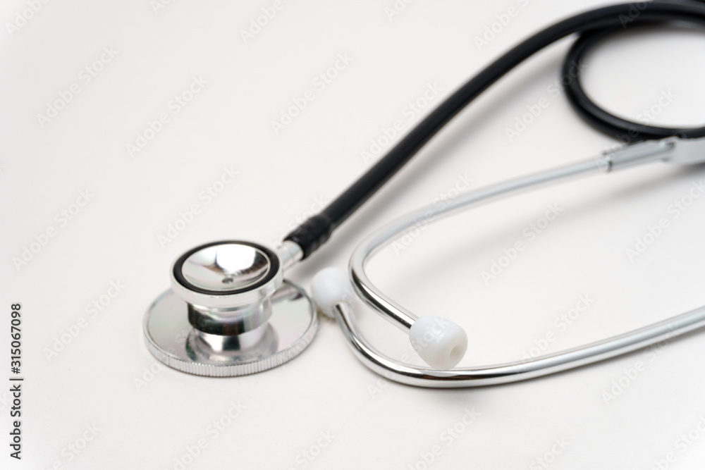 Medical, medicine stethoscope and pills on blue background. Health care or illness. Tablet or drug in hospital or pharmacy. Cardiology heart treatment. Medication prescription. Medical, medicine stethoscope and pills on blue background. Health care or illness. Tablet or drug in hospital or pharmacy. Cardiology heart treatment. Medication prescription.