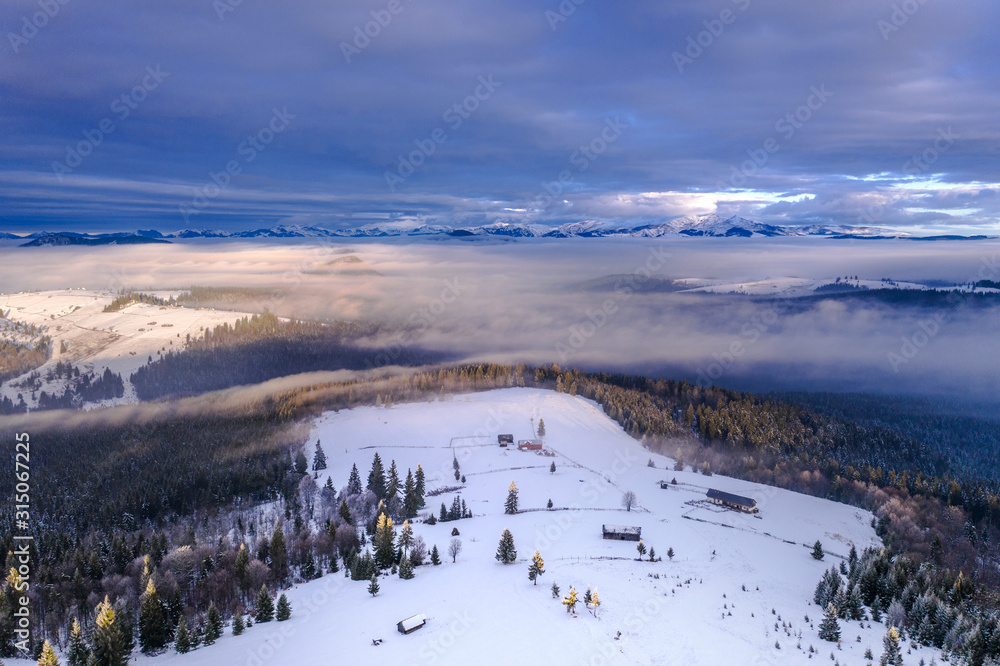 Pasul Tihuta, Romania seen from a drone early in a winter morning. 