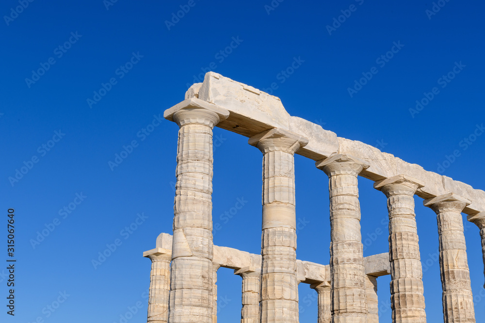 Ruins of ancient Temple of Poseidon at Cape Sounion in Attica, Greece