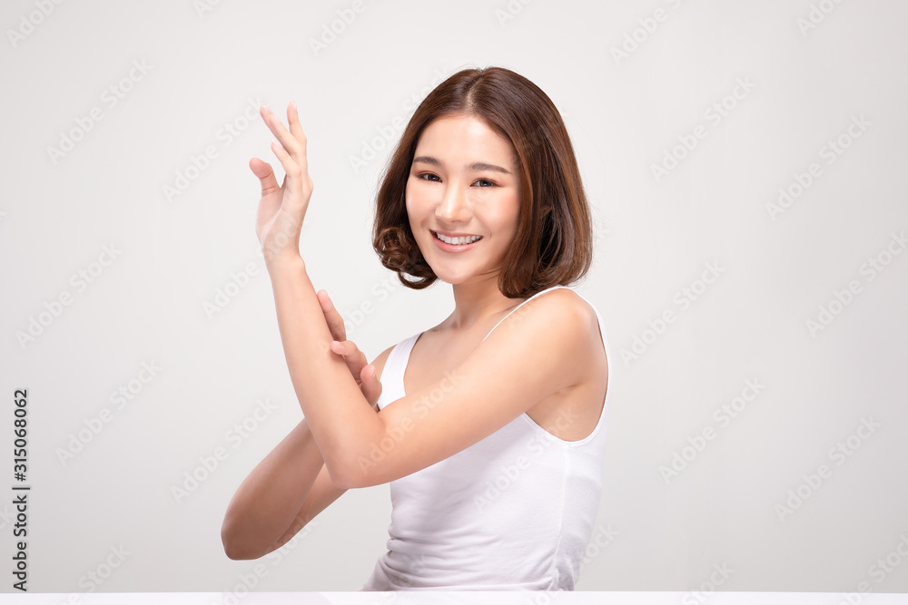 Beautiful Asian woman with short hair looking at camera smile with clean and fresh skin Happiness and cheerful with positive emotional,isolated on gray background,Beauty and Cosmetics Concept Beautiful Asian woman with short hair looking at camera smile with clean and fresh skin Happiness and cheerful with positive emotional,isolated on gray background,Beauty and Cosmetics Concept