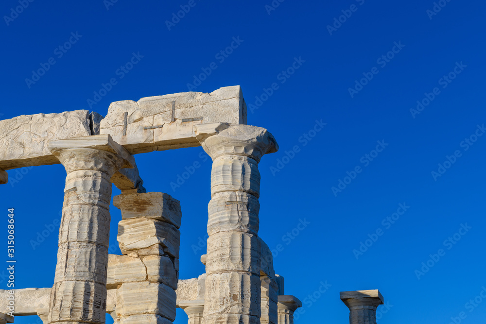 Ruins of ancient Temple of Poseidon at Cape Sounion in Attica, Greece