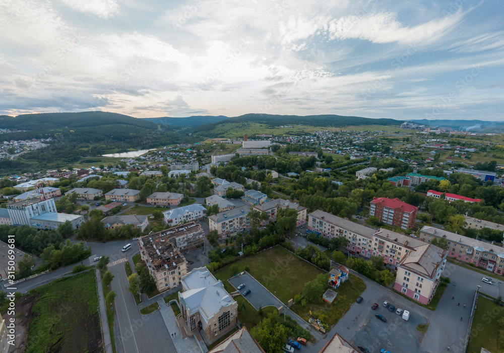 Aerial view of Satka city and mountains. Chellyabinsk region, Russia. Summer, evening