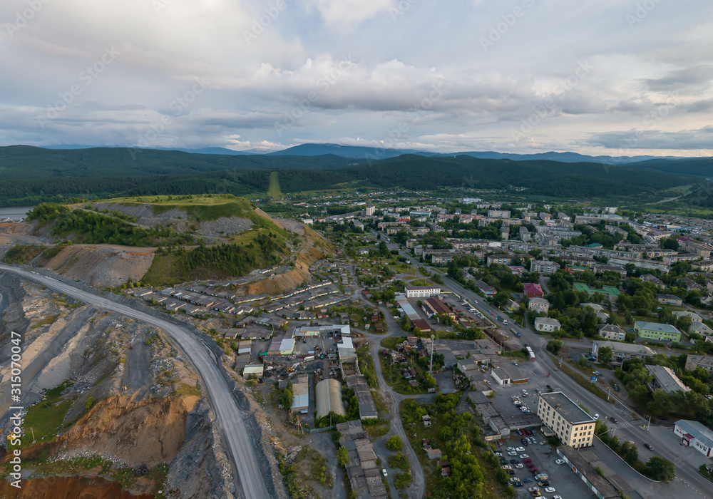 Aerial view of Satka city and mountains. Chellyabinsk region, Russia. Summer, evening