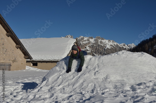 Children slide down hills