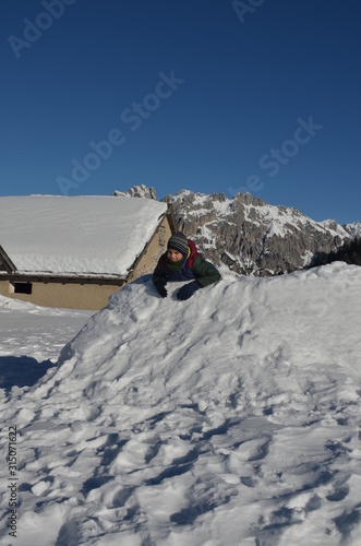 Children slide down hills