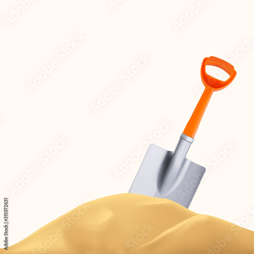 orange plastic shovel and sand hill