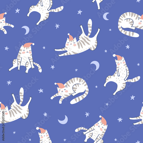 Sleeping cats in the blue night starry  sky. Vector seamless pattern. Hand drawn design for baby  fabric design.