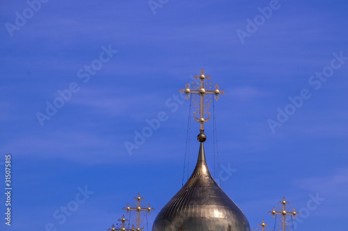 Pereslavl-Zalessky; Yaroslavl region; St. Nicholas convent; St. Nicholas Cathedral; Golden domes against a bright blue sky photo