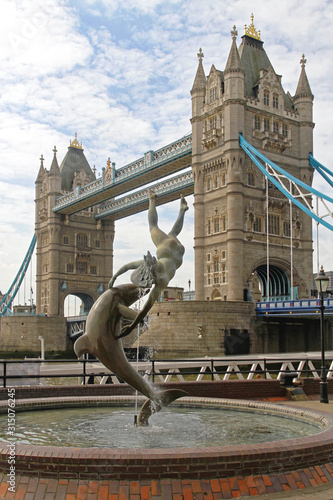 Photography Girl With Dolphin Fountain in London UK
