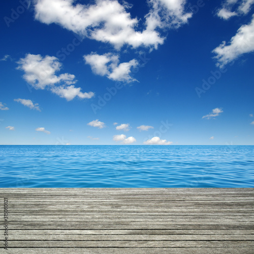  Sea water and and wooden table