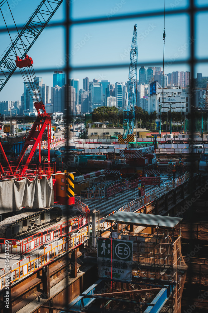 infrastructure construction site and city skyline background -