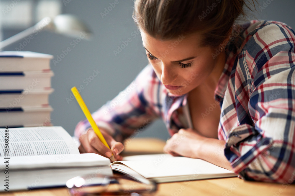 Female student learning at home Female student learning at home
