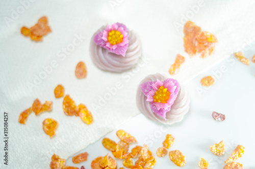 Traditional Thai desserts sweet and delicious   Beautiful candy with flower shaped.  A-lua or Allure  Thai handmade candy  Selective focus.